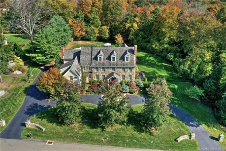 Mansion For Sale in Trumbull CT 06611. Big colonial house near waterfront with swimming pool and 3 car garage.