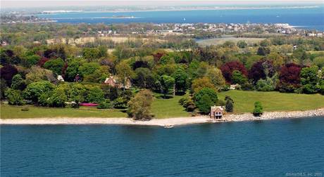 Luxury Mansion For Sale in Fairfield CT 06824. Old colonial, tudor house near beach side waterfront with swimming pool and 12 car garage.