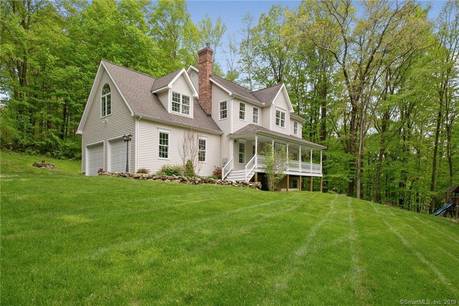 Single Family Home Sold in Sherman CT 06784. Colonial house near beach side waterfront with 2 car garage.