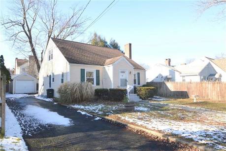 Single Family Home For Sale in Stamford CT 06906. cape cod house near beach side waterfront with 1 car garage.