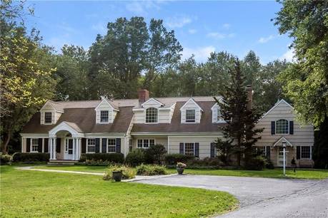 Single Family Home For Sale in Darien CT 06820. cape cod house near beach side waterfront with 2 car garage.