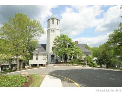 Condo Home For Sale in Ridgefield CT 06877. townhouse near waterfront with swimming pool and 1 car garage.