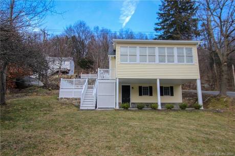 Single Family Home For Sale in New Fairfield CT 06812. bungalow house near waterfront.
