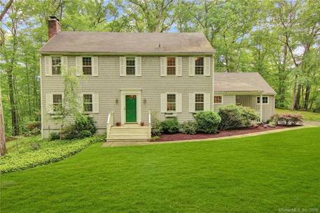 Single Family Home For Sale in Weston CT 06883. Colonial house near beach side waterfront with 2 car garage.