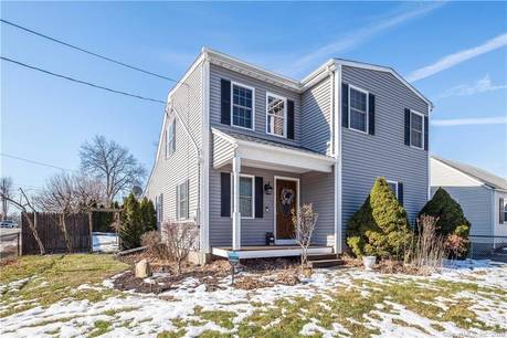 Single Family Home For Sale in Bridgeport CT 06606. Colonial house near waterfront with 1 car garage.