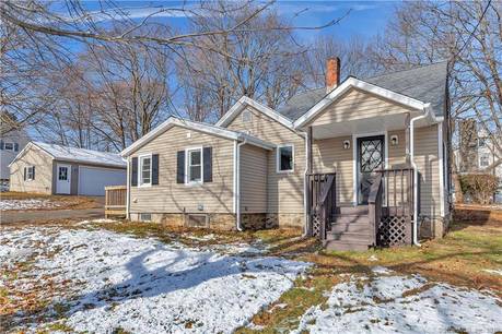 Single Family Home For Sale in Stratford CT 06614. Old cape cod house near waterfront with 2 car garage.