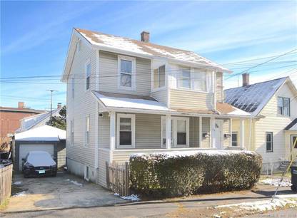 Multi Family Home For Sale in Bridgeport CT 06610. Old house near beach side waterfront with 2 car garage.