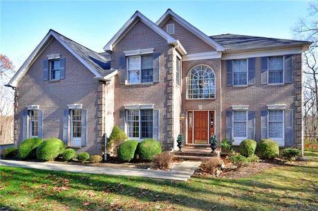 Single Family Home For Sale in Newtown CT 06470. Colonial house near waterfront with 2 car garage.