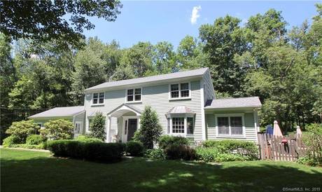 Single Family Home For Sale in Wilton CT 06897. saltbox house near waterfront with swimming pool and 2 car garage.