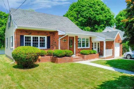 Single Family Home For Sale in Stratford CT 06614. cape cod house near beach side waterfront with 1 car garage.