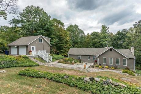 Single Family Home Sold in New Fairfield CT 06812. Old ranch, antique house near waterfront with 2 car garage.