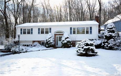 Single Family Home For Sale in Newtown CT 06470. Ranch house near waterfront with swimming pool and 1 car garage.
