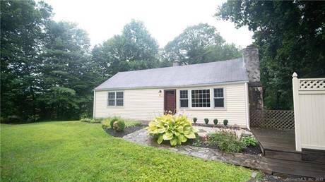 Single Family Home For Sale in Weston CT 06883. Old ranch house near waterfront with 1 car garage.