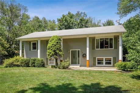 Single Family Home For Sale in Danbury CT 06811. Ranch house near beach side waterfront with 2 car garage.