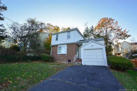 Single Family Home For Sale in Trumbull CT 06611. cape cod house near waterfront with 1 car garage.