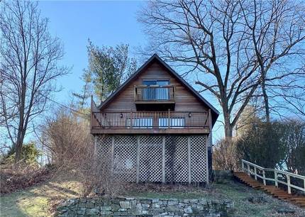 Single Family Home For Rent in Danbury CT 06811. Contemporary chalet house near beach side waterfront.