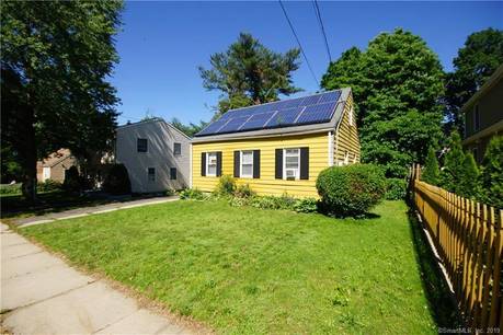 Single Family Home For Sale in Bridgeport CT 06610. cape cod house near waterfront.