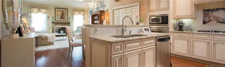 Condo Home Sold in Newtown CT 06482. townhouse near waterfront with 2 car garage.
