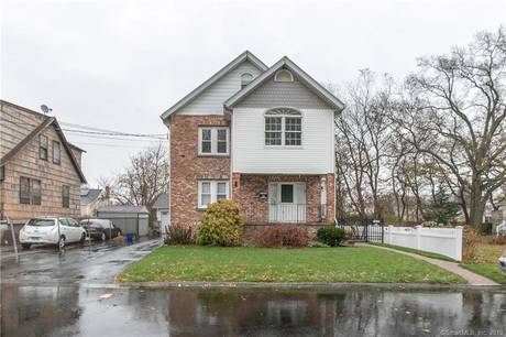 Multi Family Home For Sale in Stratford CT 06615. Old house near waterfront with 2 car garage.