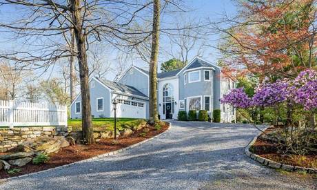 Single Family Home Sold in Westport CT 06880. Contemporary, colonial house near beach side waterfront with 2 car garage.