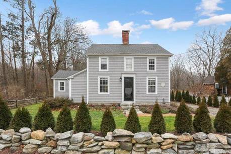 Single Family Home For Sale in Wilton CT 06897. Old antique house near waterfront with 2 car garage.