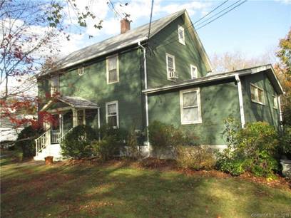 Multi Family Home For Sale in Fairfield CT 06825. Old house near river side waterfront with 2 car garage.