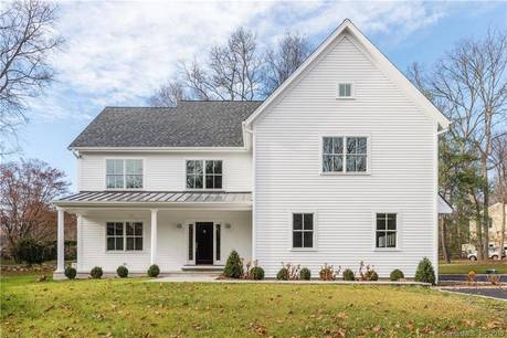 Single Family Home For Sale in Westport CT 06880. Colonial house near beach side waterfront with 2 car garage.