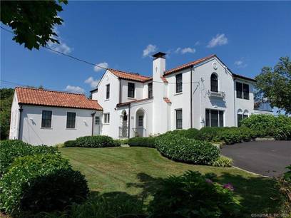 Single Family Home For Sale in Norwalk CT 06854. Old mediterranean, tudor house near waterfront with 1 car garage.