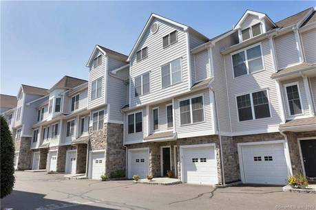 Condo Home For Sale in Stamford CT 06907. townhouse near waterfront with swimming pool and 1 car garage.