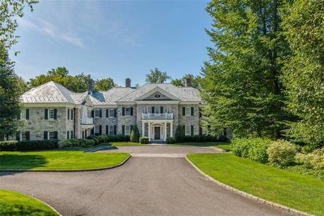 Luxury Mansion For Sale in Greenwich CT 06831. Big colonial, georgian house near waterfront with swimming pool and 7 car garage.